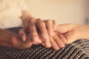 close up of holding elderly hands